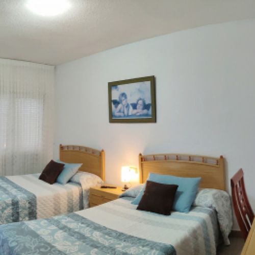 Habitación doble azul Hostal La Llave