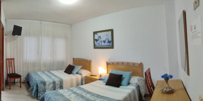 Habitación doble azul Hostal La Llave