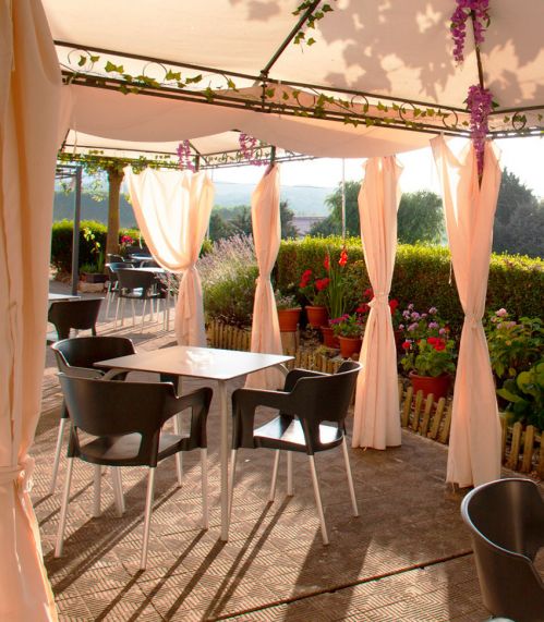 Terraza exterior en Hostal La Nave